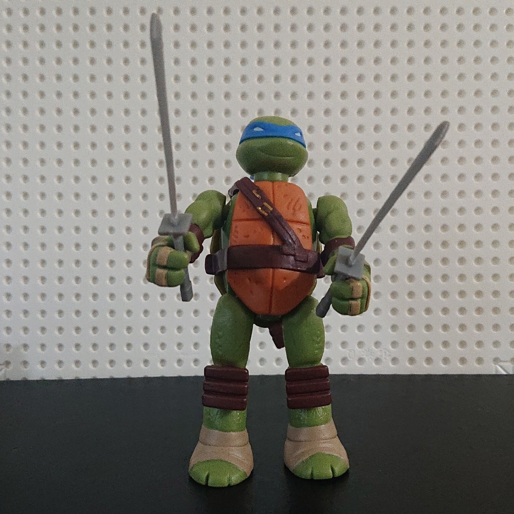 Ninja Action Figure with Orange and Green Armor